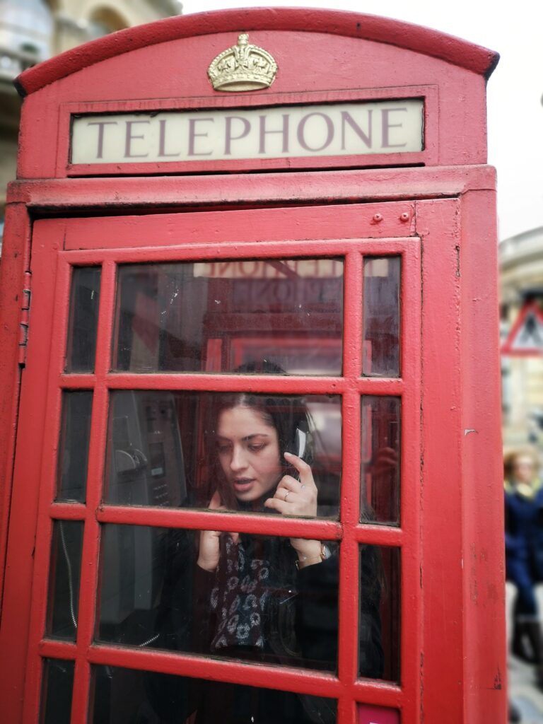 pexels-constantin-adelina-3628359 Person in telephone box